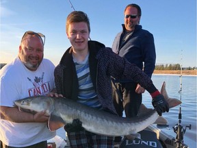 Jason and Jevyn Phillipchuk with one of the big beauties they caught recently in Rainy River.