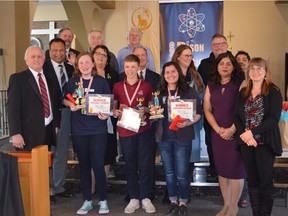 Award winners Emily Doyle (left) and Vrinda Vyas of Holy Cross School flank Jonah Norman of Christ the King School following the second annual Bison Regional Science Fair. The three will represent Manitoba at the Canada Wide Science Fair in Ottawa, May 12-19.