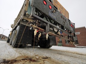 A Pennsylvania Department of Transportation anti-icing truck sprays a de-icing cocktail of brine and beet juice. The solution is one of several snow-clearing options the City of Winnipeg is considering. 
Gene J. Puskar/AP Photo Files