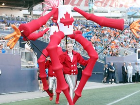 Jessica Burzuik controls a giant puppets, which makes up a whimsical summer Canada 150 Parade during the closing ceremony for the 2017 Canada Summer Games at Investors Group Field in Winnipeg, Man., on Sunday, August 13, 2017. The Games produced a $2.6 million surplus. 
Brook Jones/Postmedia Network Files