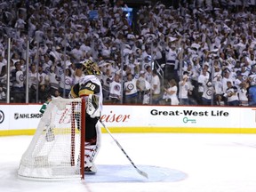 WINNIPEG, MB - MAY 12: Marc-Andre Fleury #29 of the Vegas Golden Knights reacts after allowing a second period goal against the Winnipeg Jets during the second period in Game One of the Western Conference Finals during the 2018 NHL Stanley Cup Playoffs at Bell MTS Place on May 12, 2018 in Winnipeg, Canada.  (Photo by Elsa/Getty Images)