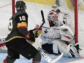 Reilly Smith of the Golden Knights scores a second-period goal against Braden Holtby of the Washington Capitals, one of a combined 10 goals notched by the teams in Game 1 of the Stanley Cup Final in Las Vegas. The Golden Knights won 6-4.