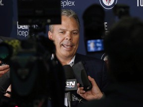 Winnipeg Jets GM Kevin Cheveldayoff talks to the media on opening day of the Jets training camp in Winnipeg on September 14, 2017. (THE CANADIAN PRESS/John Woods)