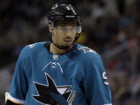 In this March 20, 2018, file photo, San Jose Sharks' Evander Kane waits for play to resume against the New Jersey Devils in San Jose, Calif. (AP Photo/Marcio Jose Sanchez, File)