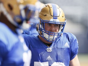 New addition to the Winnipeg Blue Bombers Adam Bighill (50) runs through drills at a pre-season training camp in Winnipeg, Thursday, May 24, 2018. THE CANADIAN PRESS/John Woods ORG XMIT: JGW101