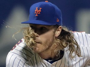 New York Mets' Noah Syndergaard, a former Jays prospect, delivers a pitch against the Blue Jays Tuesday, May 15, 2018, in New York. (AP Photo/Julie Jacobson)