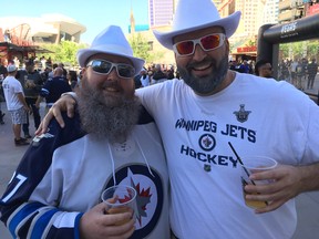 Marc Connelly (left) and Art Roy came from Winnipeg for Roy’s stag and got the added bonus of a little Jets playoff hockey. Roy said the “whiteout came south and it’s not melting.”  (TED WYMAN/WINNIPEG SUN)