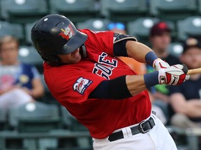 Goldeyes third baseman Josh Mazzola swings against the Lincoln Saltdogs at Shaw Park in Winnipeg on Tuesday. Mazzola will tie a record for most consecutive American Association games played should he appear in both contests on Thursday. (KEVIN KING/WINNIPEG SUN)