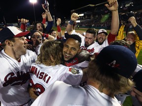 The Winnipeg Goldeyes celebrate after defeating the Wichita Wingnuts in Game 5 to win the American Association championship series at Shaw Park in Winnipeg on Wed., Sept. 20, 2017. (KEVIN KING/WINNIPEG SUN FILES)