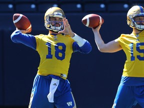 Quarterbacks Alex Ross (left) and Matt Nichols throw during Winnipeg Blue Bombers mini-camp at Investors Group Field in Winnipeg on Tues., April 24, 2018. Kevin King/Winnipeg Sun/Postmedia Network