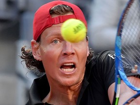 Czech Republic's Tomas Berdych returns a shot to Canada's Denis Shapovalov during their ATP Masters tournament tennis match on May 15, 2018