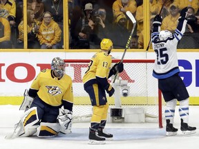 Winnipeg Jets centre Paul Stastny celebrates his goal against Predators goalie Pekka Rinne last night in Nashville. AP