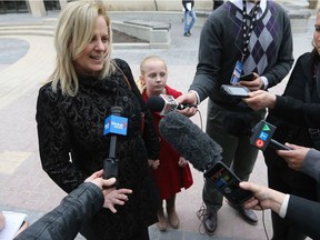 Mayoral candidate Jenny Motkaluk held a very brief media availability in Winnipeg Tuesday, accompanied by her daughter Emily.