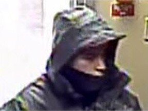 Winnipeg Police released a security image on Tuesday of a man wanted in connection with the robbery of a 12-year-old boy in the North Point area in mid-February.