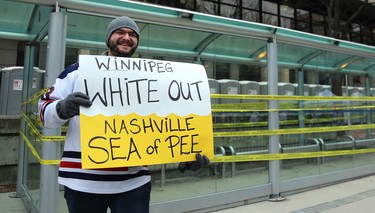 A Winnipeg Jets fan makes a comment on colour with his sign before his team met the Nashville Predators in Game 2 of their second-round playoff series in Winnipeg on Tues., May 1, 2018. Kevin King/Winnipeg Sun/Postmedia Network