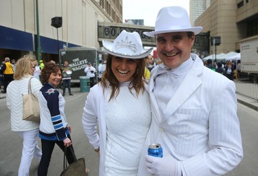 Rob Magnusson (right) and girlfriend Viola Bauer pose for a photo during the street party before the Winnipeg Jets faced the Nashville Predators in Game 2 of their second-round playoff series in Winnipeg on Tues., May 1, 2018. Kevin King/Winnipeg Sun/Postmedia Network
