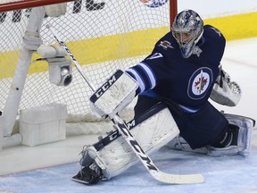 Winnipeg Jets goaltender Connor Hellebuyck is up for the Vezina Trophy as the NHL's top goalie but will likely leave Las Vegas empty-handed.