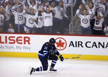 Winnipeg Jets defenceman Dustin Byfuglien celebrates his goal against the Nashville Predators during Game 2 of their second-round playoff series in Winnipeg on Tues., May 1, 2018. Kevin King/Winnipeg Sun/Postmedia Network