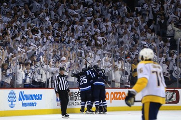 The Winnipeg Jets celebrate an empty-net goal from Blake Wheeler against the Nashville Predators during Game 2 of their second-round playoff series in Winnipeg on Tues., May 1, 2018. Kevin King/Winnipeg Sun/Postmedia Network