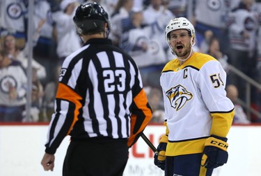 Nashville Predators defenceman Roman Josi argues a penalty call with referee Brad Watson during Game 2 of their second-round playoff series against the Winnipeg Jets in Winnipeg on Tues., May 1, 2018. Kevin King/Winnipeg Sun/Postmedia Network