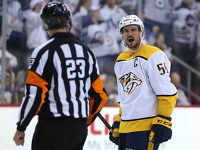 Nashville Predators defenceman Roman Josi argues a penalty call with referee Brad Watson during Game 2 of their second-round playoff series against the Winnipeg Jets in Winnipeg on Tues., May 1, 2018. Kevin King/Winnipeg Sun/Postmedia Network