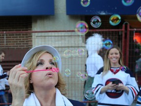 People pack the streets for the Whiteout Party prior to Game 4 of the Winnipeg Jets and Nashville Predators second-round NHL playoff series in Winnipeg on Thurs., May 3, 2018. Kevin King/Winnipeg Sun/Postmedia Network