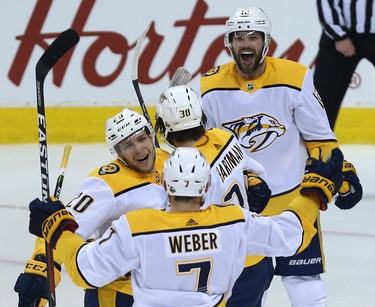 The Nashville Predators celebrate a goal from Ryan Hartman during Game 4 of their second-round NHL playoff series against the Winnipeg Jets in Winnipeg on Thurs., May 3, 2018. Kevin King/Winnipeg Sun/Postmedia Network