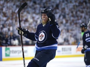 Winnipeg Jets forward Patrik Laine celebrates his goal late in the third period against the Nashville Predators during Game 4 of their second-round NHL playoff series in Winnipeg on Thurs., May 3, 2018. Kevin King/Winnipeg Sun/Postmedia Network