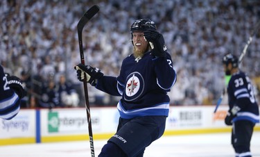 Winnipeg Jets forward Patrik Laine celebrates his goal late in the third period against the Nashville Predators during Game 4 of their second-round NHL playoff series in Winnipeg on Thurs., May 3, 2018. Kevin King/Winnipeg Sun/Postmedia Network