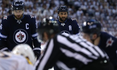 Winnipeg Jets defenceman Dustin Byfuglien focuses late during Game 4 of their second-round NHL playoff series against the Nashville Predators in Winnipeg on Thurs., May 3, 2018. Kevin King/Winnipeg Sun/Postmedia Network