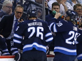 Winnipeg Jets head coach Paul Maurice speaks to his troops during a third-period timeout against the Nashville Predators during Game 4 of their second-round NHL playoff series in Winnipeg on Thurs., May 3, 2018. Kevin King/Winnipeg Sun/Postmedia Network