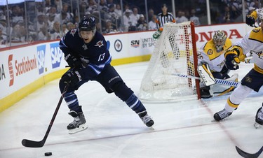 Winnipeg Jets forward Brandon Tanev chases down a loose puck against the Nashville Predators during Game 4 of their second-round NHL playoff series in Winnipeg on Thurs., May 3, 2018. Kevin King/Winnipeg Sun/Postmedia Network