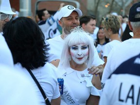 Fans get geared up at the Whiteout Street Party prior to the Winnipeg Jets facing the Nashville Predators in Game 6 of their NHL playoff series in Winnipeg on Mon., May 7, 2018. Kevin King/Winnipeg Sun/Postmedia Network