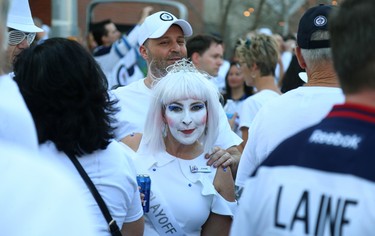 Fans get geared up at the Whiteout Street Party prior to the Winnipeg Jets facing the Nashville Predators in Game 6 of their NHL playoff series in Winnipeg on Mon., May 7, 2018. Kevin King/Winnipeg Sun/Postmedia Network