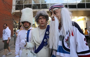 The Queen is a little leary of her company at the Whiteout Street Party prior to the Winnipeg Jets facing the Nashville Predators in Game 6 of their NHL playoff series in Winnipeg on Mon., May 7, 2018. Kevin King/Winnipeg Sun/Postmedia Network