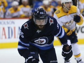 Winnipeg Jets forward Mathieu Perreault gets after a loose puck in the Nashville Predators zone during Game 6 of their NHL playoff series in Winnipeg on Mon., May 7, 2018. Kevin King/Winnipeg Sun/Postmedia Network