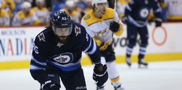 Winnipeg Jets forward Mathieu Perreault gets after a loose puck in the Nashville Predators zone during Game 6 of their NHL playoff series in Winnipeg on Mon., May 7, 2018. Kevin King/Winnipeg Sun/Postmedia Network