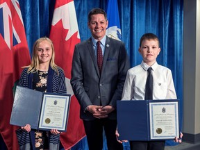 Mayor Brian Bowman (centre) with Kid Mayor winner Nazar Viznytsya (right) and Deputy Mayor Gabi Wagner at City Hall in Winnipeg on Thurs., May 10, 2018. Aaron Ives/HANDOUT