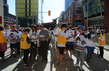 Fans wait to have their ticket checked entering the Whiteout Street Party prior to the Winnipeg Jets facing the Vegas Golden Knights in Game 1 of their Western Conference final series in Winnipeg on Sat., May 12, 2018. Kevin King/Winnipeg Sun/Postmedia Network