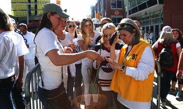 Fans wait to have their ticket checked entering the Whiteout Street Party prior to the Winnipeg Jets facing the Vegas Golden Knights in Game 1 of their Western Conference final series in Winnipeg on Sat., May 12, 2018. Kevin King/Winnipeg Sun/Postmedia Network