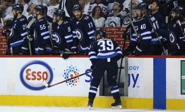 Winnipeg Jets defenceman Toby Enstrom is injured as he heads to the bench during Game 1 of their Western Conference final series against the Vegas Golden Knights in Winnipeg on Sat., May 12, 2018. Kevin King/Winnipeg Sun/Postmedia Network