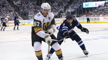 Winnipeg Jets forward Andrew Copp (right) gets after Vegas Golden Knights forward David Perron during Game 1 of their Western Conference final series in Winnipeg on Sat., May 12, 2018. Kevin King/Winnipeg Sun/Postmedia Network