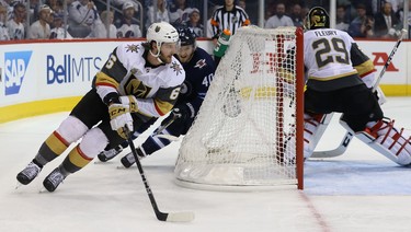 Winnipeg Jets forward Joel Armia (centre) chases Vegas Golden Knights defenceman Colin Miller behind the net of Marc-Andre Fleury during Game 1 of their Western Conference final series in Winnipeg on Sat., May 12, 2018. Kevin King/Winnipeg Sun/Postmedia Network