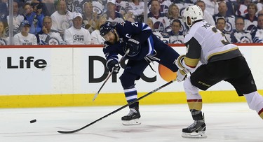 Winnipeg Jets forward Blake Wheeler fires a shot at Vegas Golden Knights goaltender Marc-Andre Fleury as Brayden McNabb defends during Game 1 of their Western Conference final series in Winnipeg on Sat., May 12, 2018. Kevin King/Winnipeg Sun/Postmedia Network