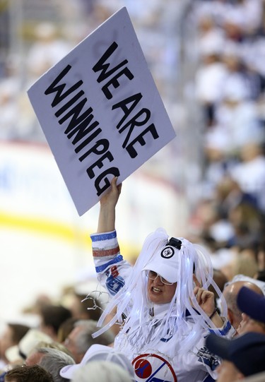 A fan celebrates during Game 1 of the Western Conference final series between the Winnipeg Jets and Vegas Golden Knights in Winnipeg on Sat., May 12, 2018. Kevin King/Winnipeg Sun/Postmedia Network