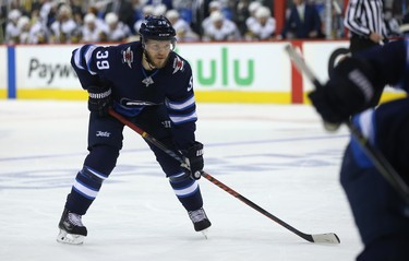 Winnipeg Jets defenceman Toby Enstrom sets up for a face-off against the Vegas Golden Knights during Game 1 of their Western Conference final series in Winnipeg on Sat., May 12, 2018. Kevin King/Winnipeg Sun/Postmedia Network