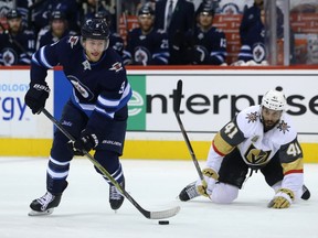 Winnipeg Jets forward Andrew Copp (left) leaves Vegas Golden Knights forward Pierre-Edouard Bellemare behind during Game 1 of their Western Conference final series in Winnipeg on Sat., May 12, 2018. Kevin King/Winnipeg Sun/Postmedia Network