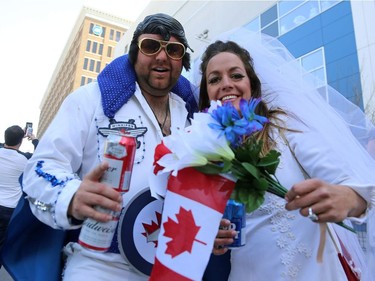 Jim Hollingsworth and Alison Ritchie all decked out at the Whiteout Street Party before the Winnipeg Jets met the Vegas Golden Knights in Game 2 of the Western Conference final in Winnipeg on Mon., May 14, 2018. Kevin King/Winnipeg Sun/Postmedia Network