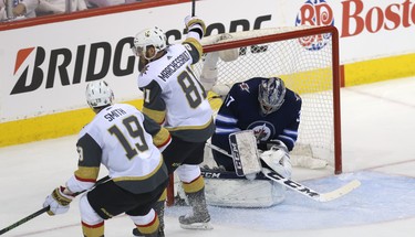 Vegas Golden Knights centre Jonathan Marchessault celebrates his goal past Winnipeg Jets goaltender Connor Hellebuyck during Game 2 of the Western Conference final in Winnipeg on Mon., May 14, 2018. Kevin King/Winnipeg Sun/Postmedia Network