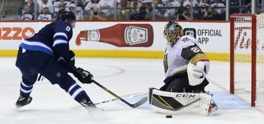 Vegas Golden Knights goaltender Marc-Andre Fleury makes a stop on Winnipeg Jets forward Andrew Copp during Game 2 of the Western Conference final in Winnipeg on Mon., May 14, 2018. Kevin King/Winnipeg Sun/Postmedia Network